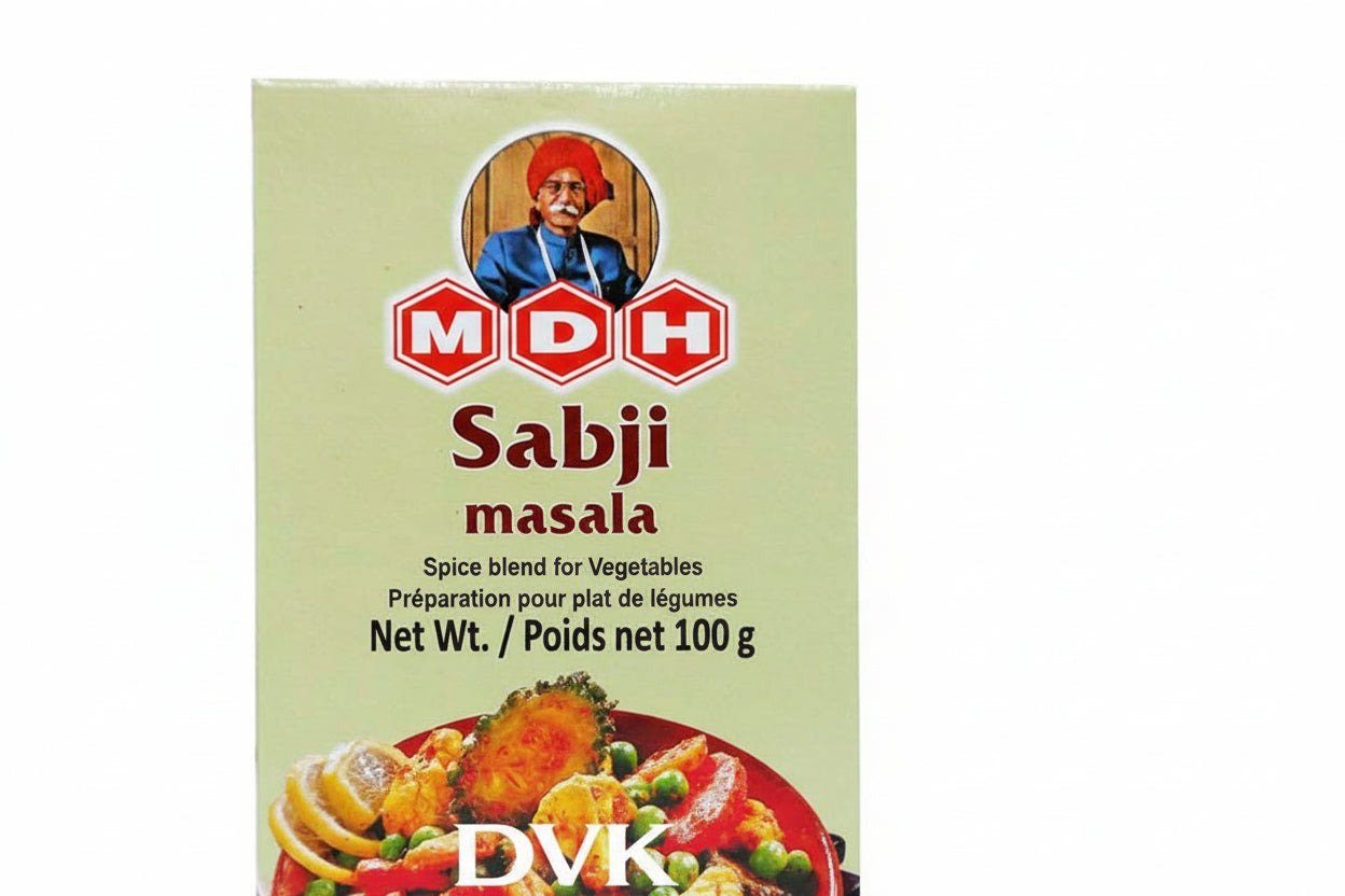 Box of MDH Sabji masala spice blend with a picture of vegetables on a green background