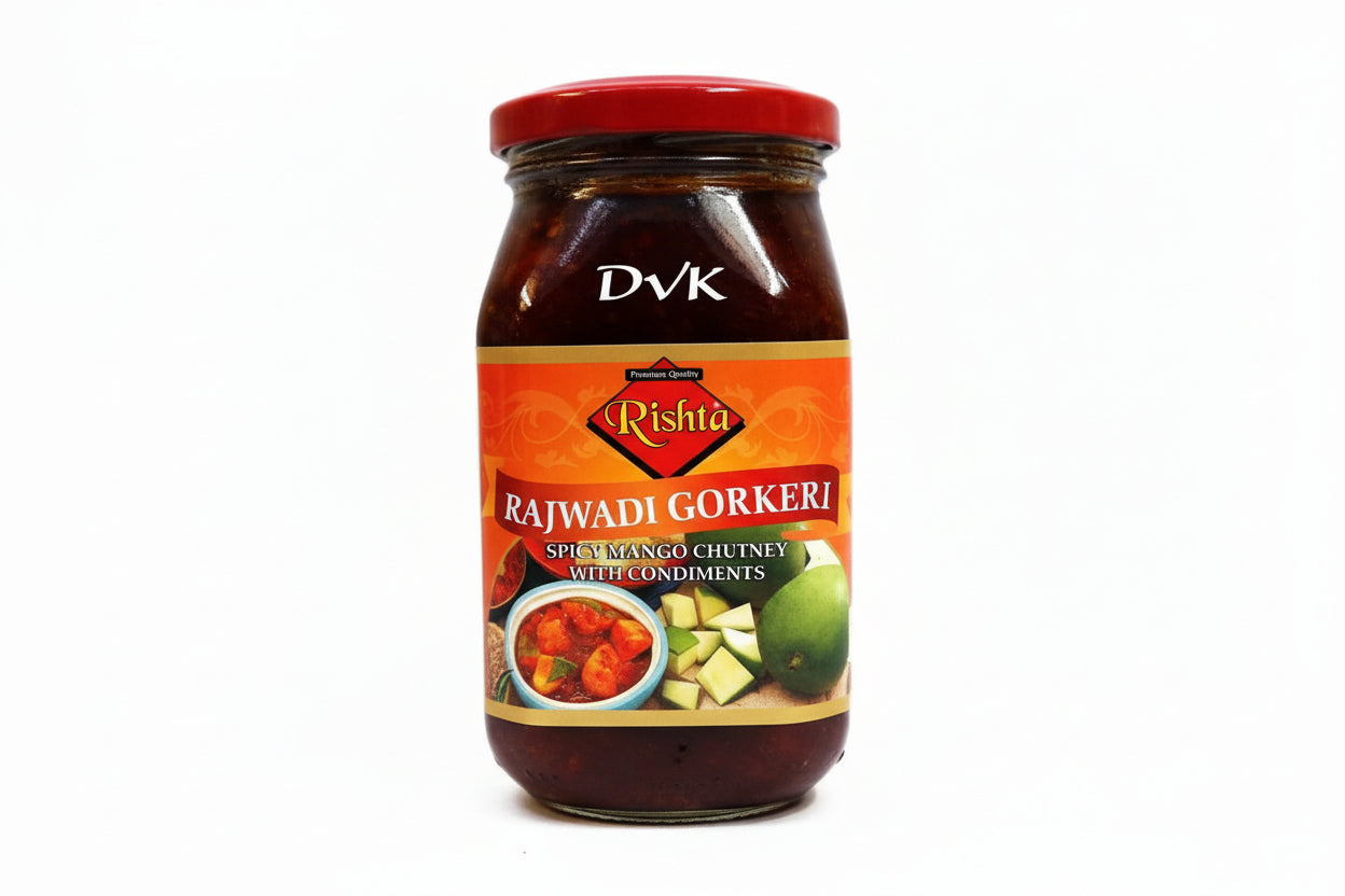 Jar of Rishita Rajwadi Gorker spicy mango chutney with a red lid on a white background