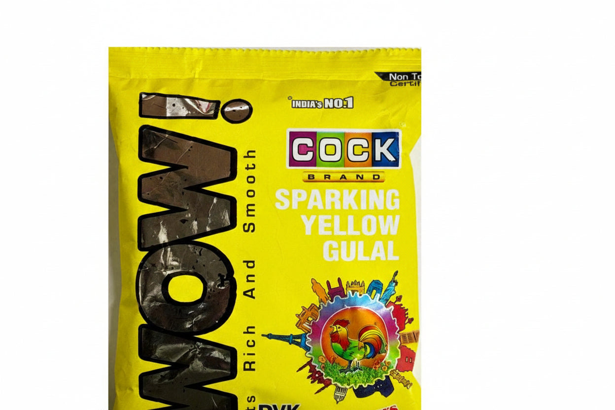 Yellow packet of COCK Brand Wow gulal with colorful design and text.
