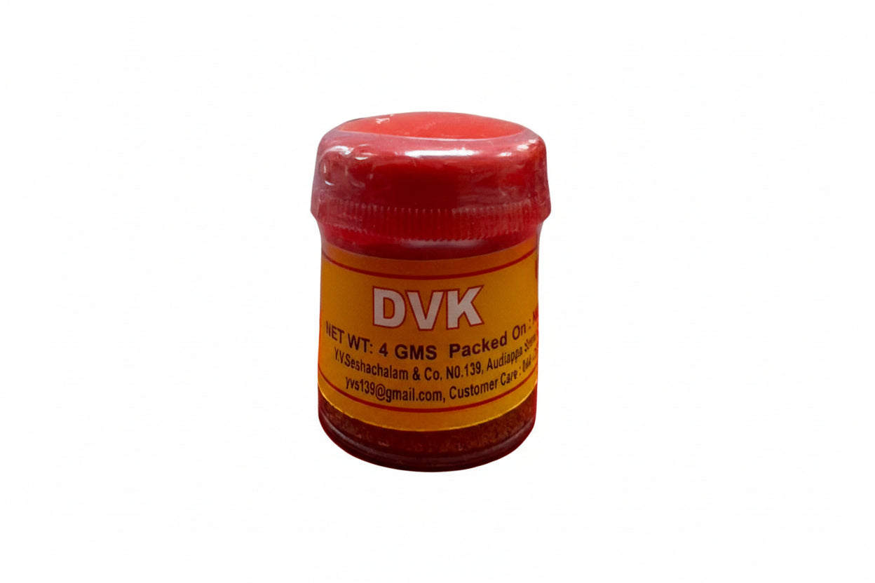 Small container with red lid and yellow label on a white background