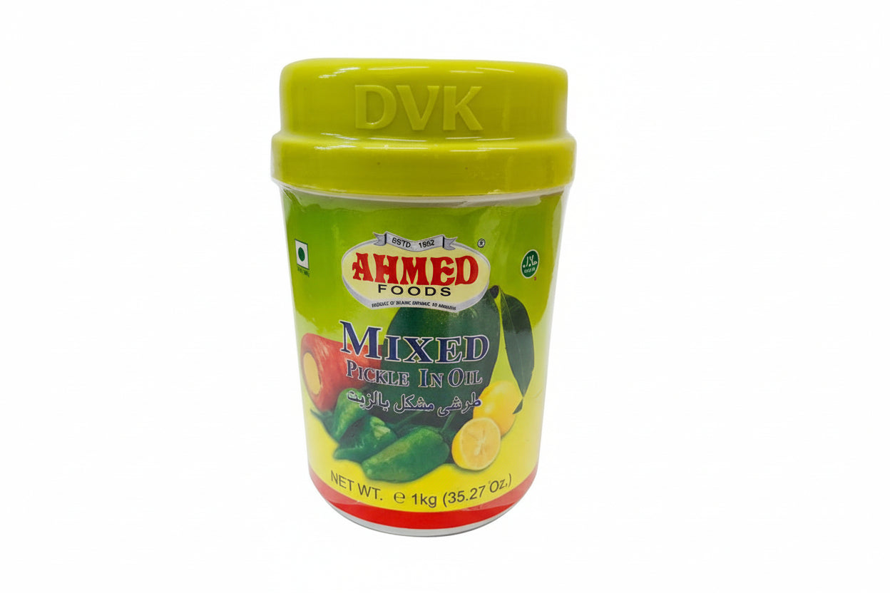 Jar of Ahmed Foods Mixed Pickle in Oil with a green lid on a white background