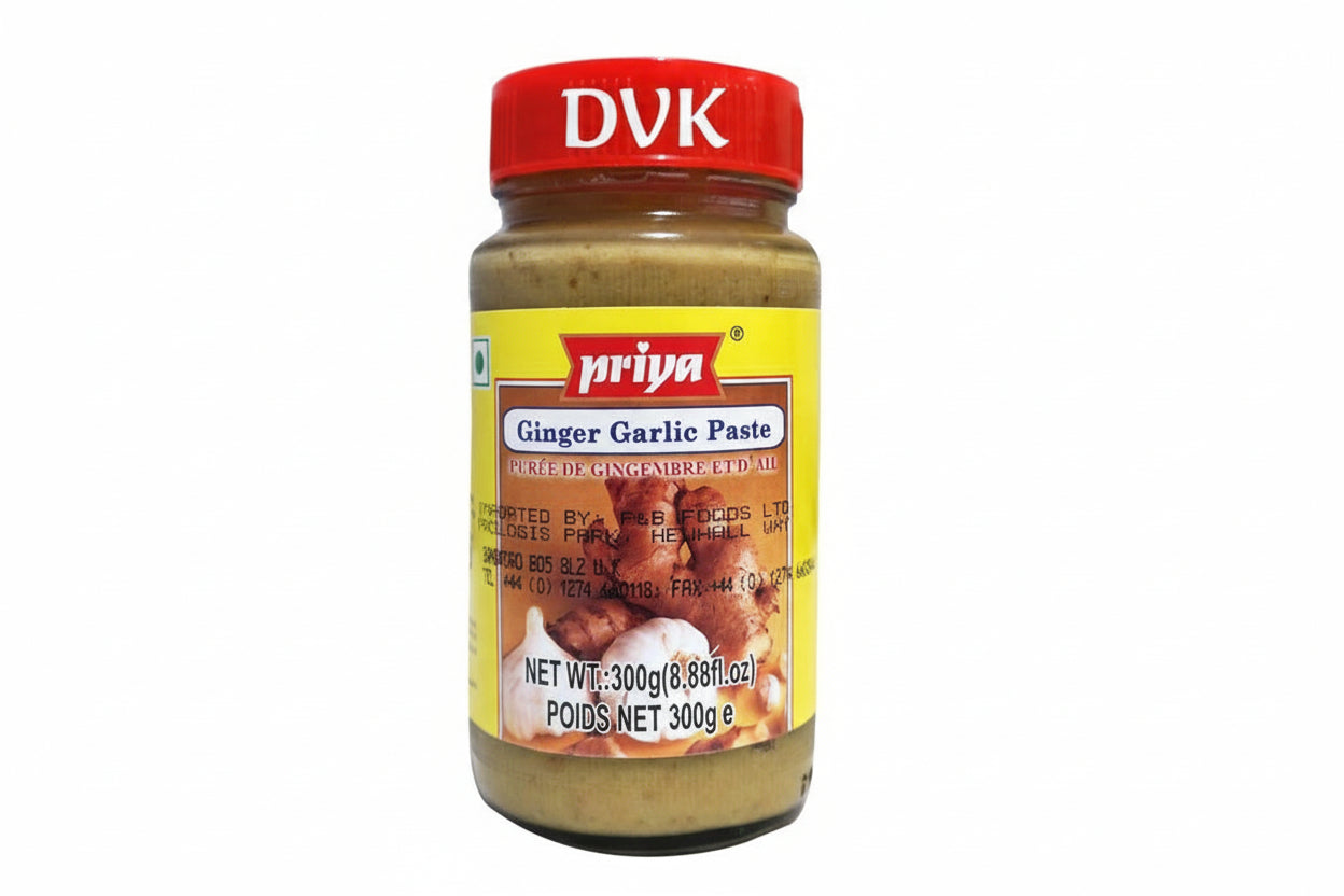 Jar of Priya Ginger Garlic Paste with a red lid on a white background