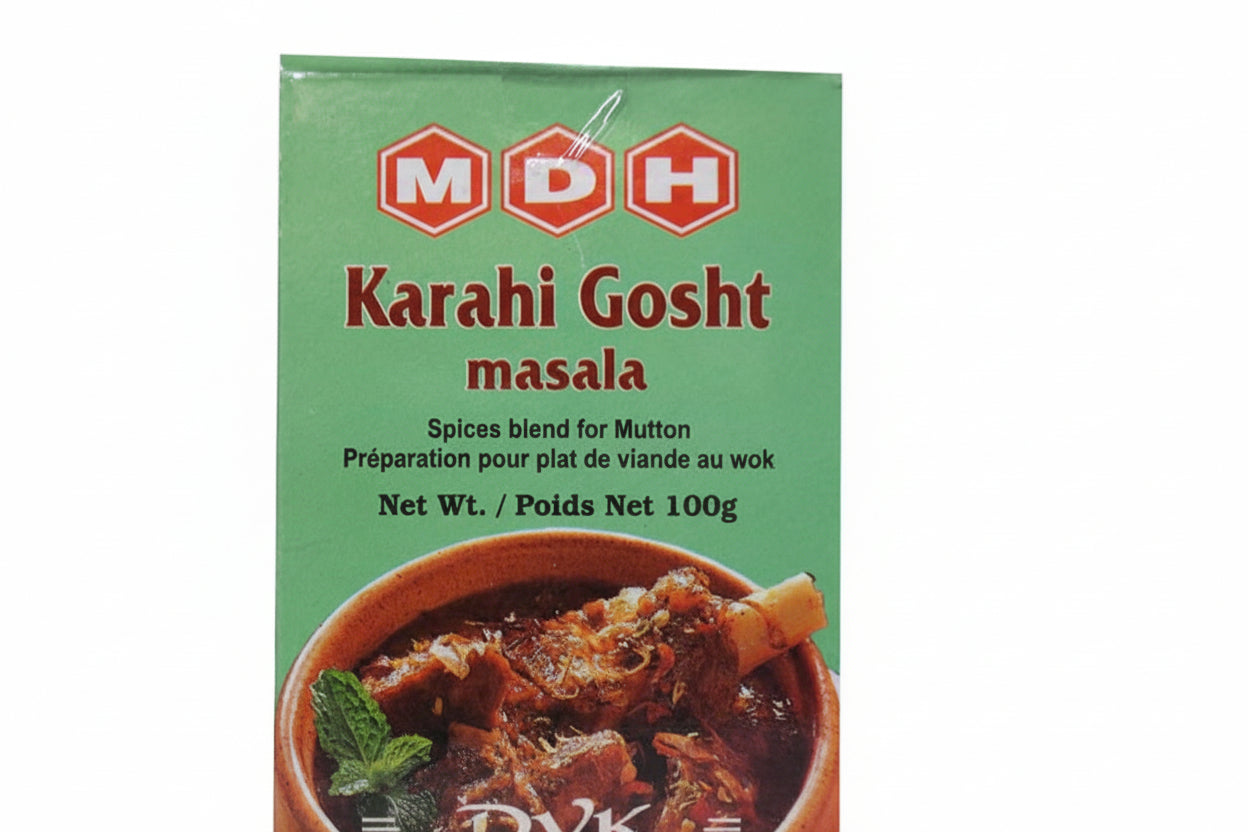 MDH Karahi Gosht masala spice blend packaging with a bowl of mutton dish on a green background.