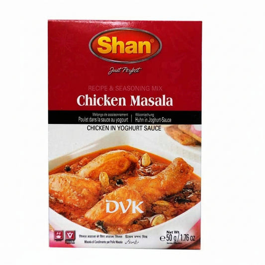 Shan Chicken Masala seasoning mix box with chicken dish on a white background