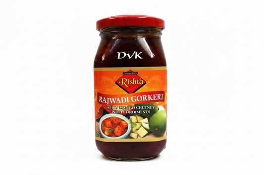 Jar of Rishita Rajwadi Gorker spicy mango chutney with a red lid on a white background