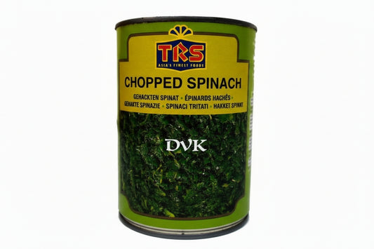 Can of TKS chopped spinach with a green label on a white background