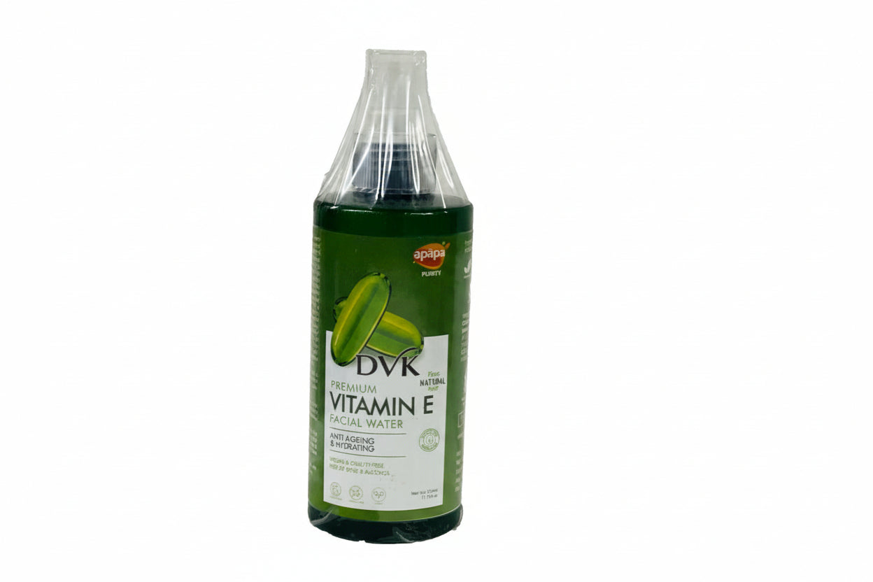 Bottle of Vitamin E facial water with green label on a white background