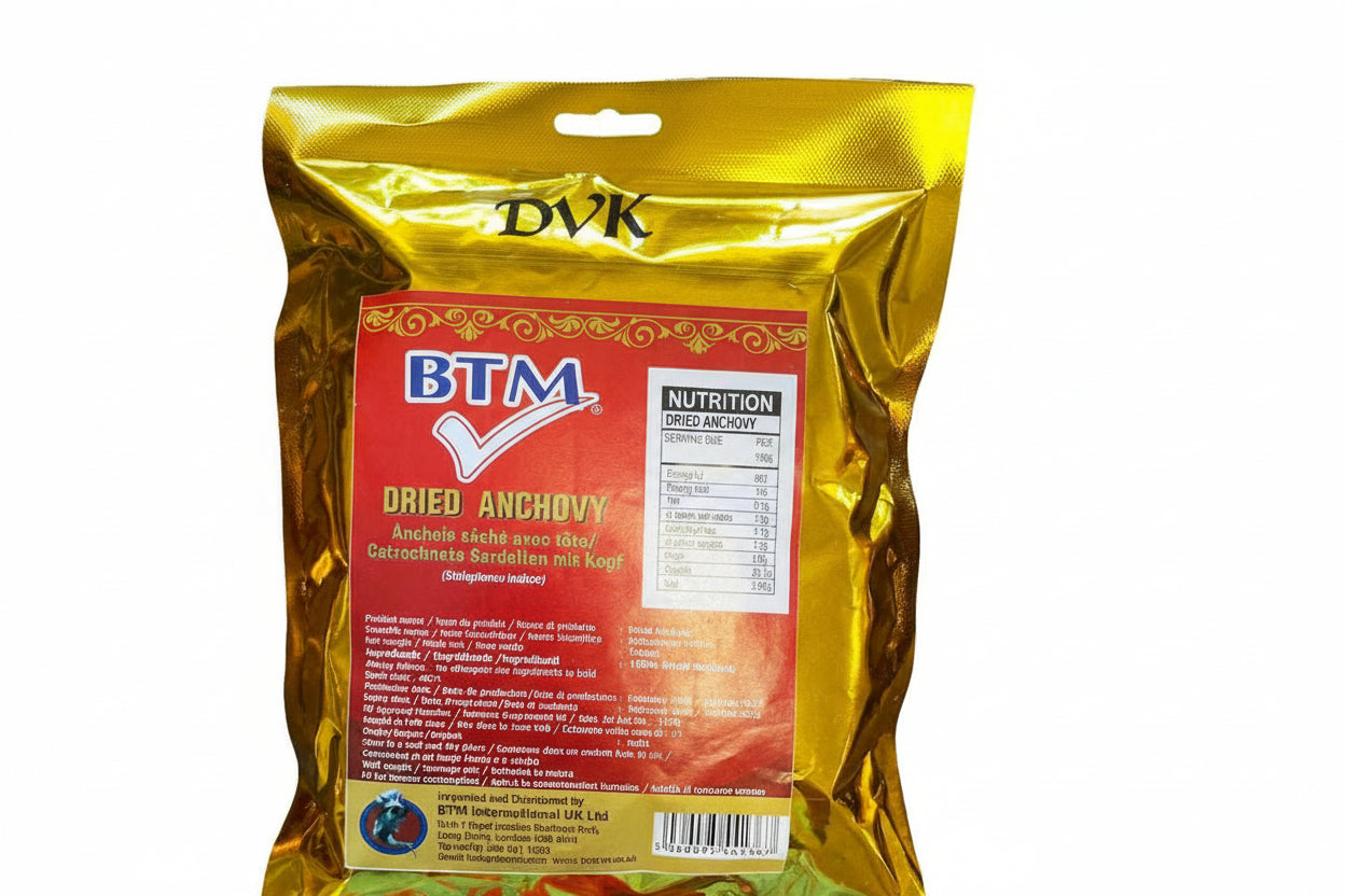 Packaged dried anchovies with gold and red label on a white background
