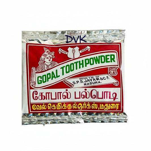 Packaged Gopal Tooth Powder with a red and white label on a white background