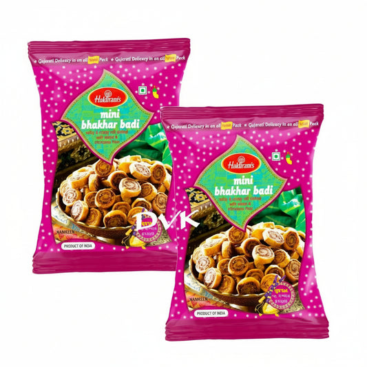 Two pink packages of Haldiram's mini bhakar badis on a white background