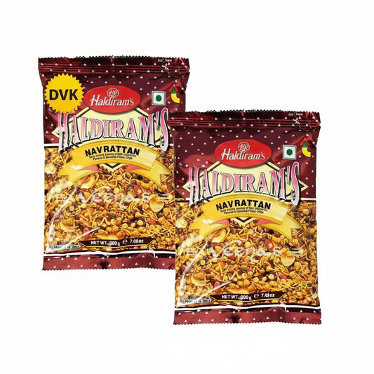 Two packages of Haldiram's Navrattan on a white background