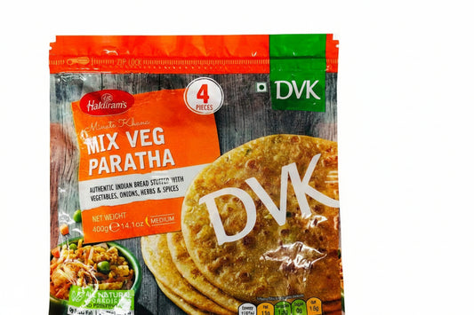 Packaged mix veg paratha with branding and product details on a wooden surface