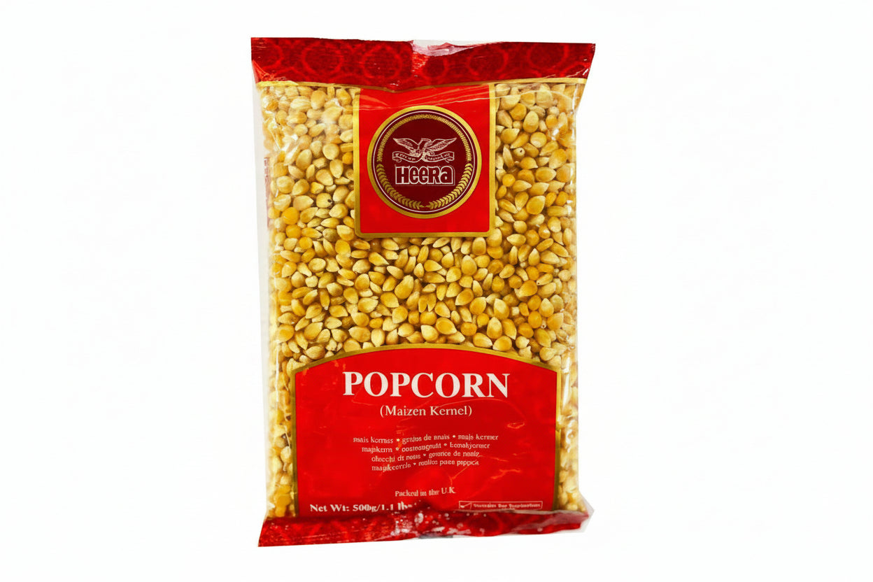 Bag of Heera popcorn kernels with red and yellow packaging on a white background