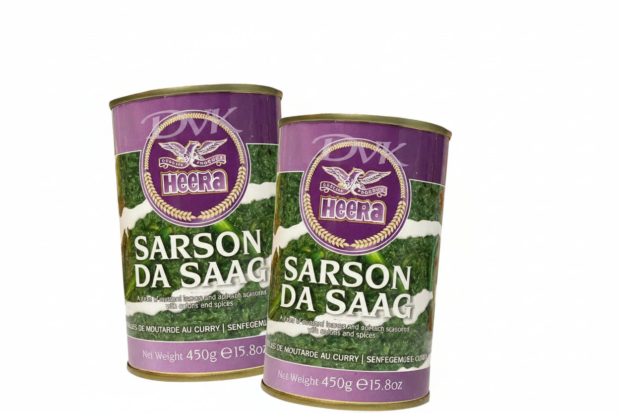 Two cans of Heera Sarson Da Saag on a white background