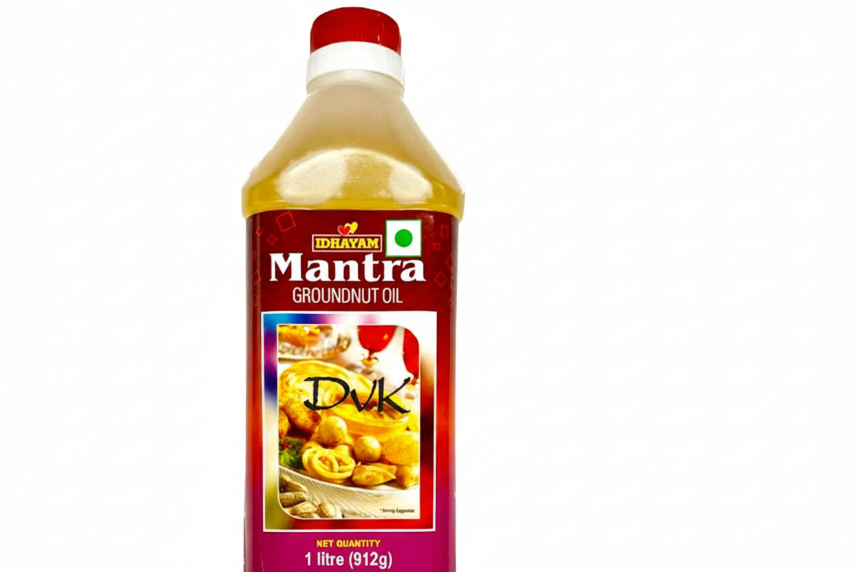 Bottle of Mantra Groundnut Oil with a red label on a white background