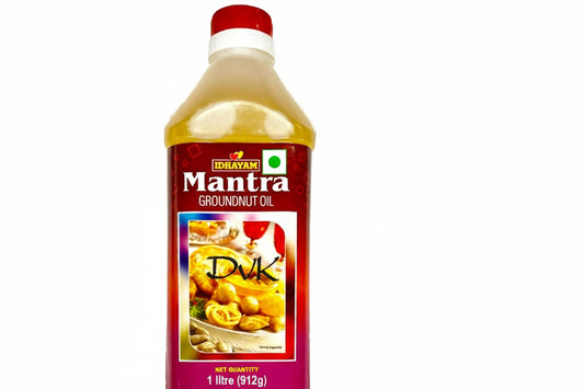 Bottle of Mantra Groundnut Oil with a red label on a white background