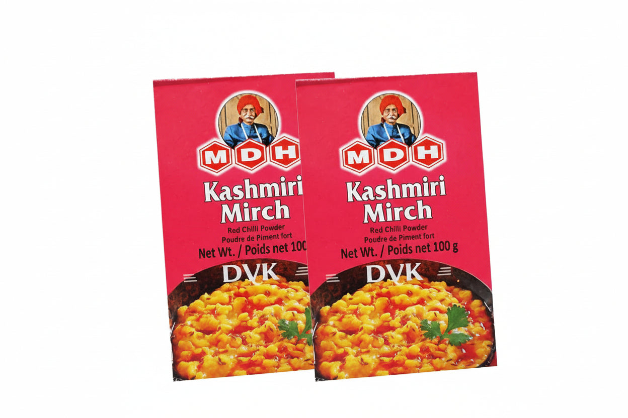 Two packages of MDH Kashmiri Mirch red chilli powder on a white background