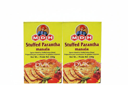 Two boxes of MDH Stuffed Parantha masala on a white background