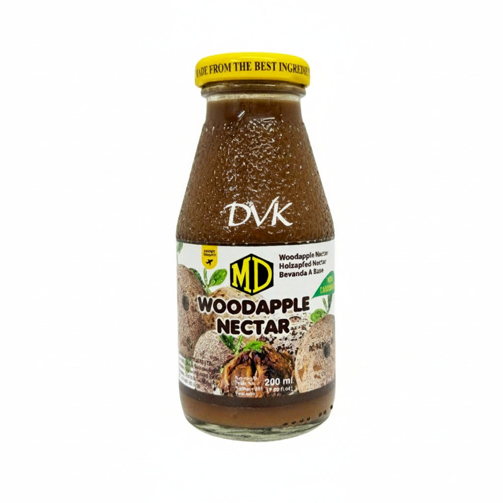 Bottle of Woodapple Nectar with label on a white background