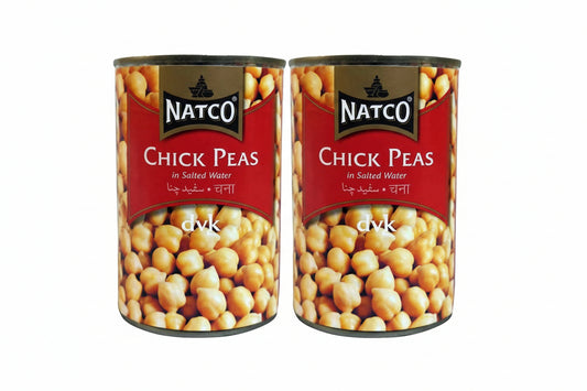 Two cans of Natco Chick Peas on a white background