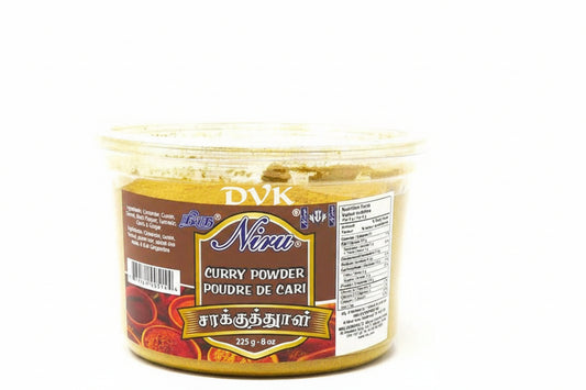 Container of Niva Curry Powder with label on a white background