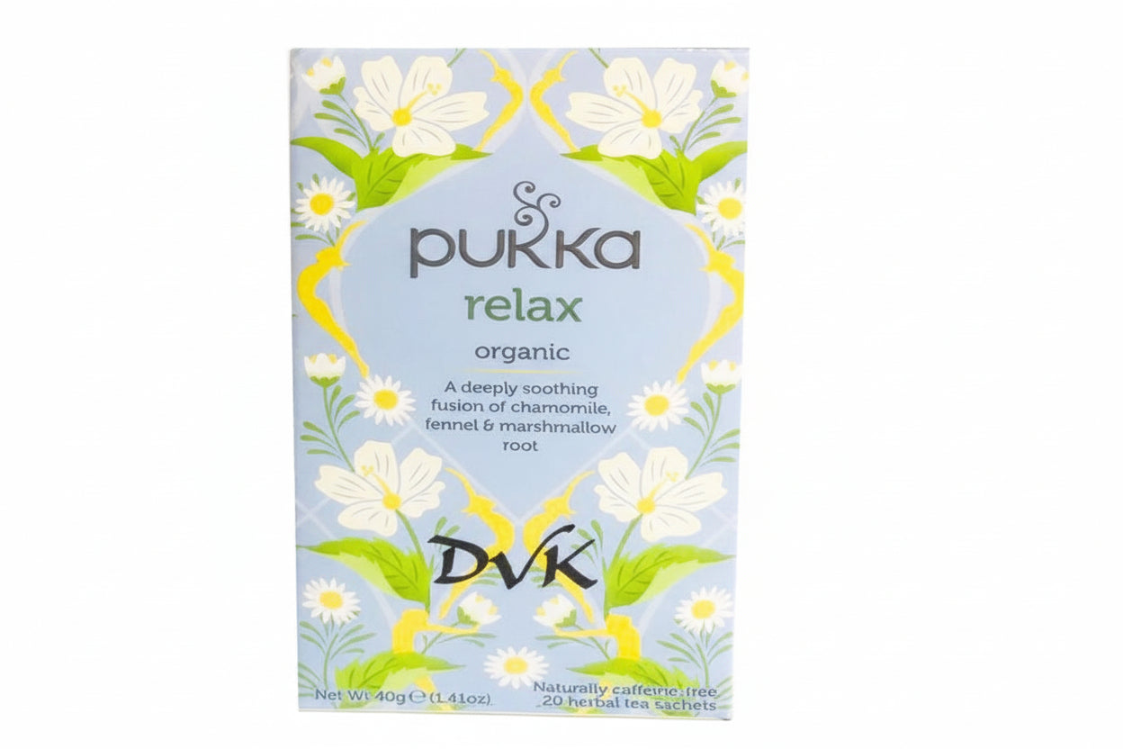 Pukka relax organic tea packaging with floral design on a white background