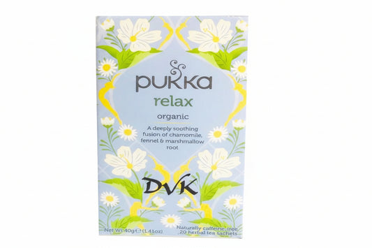 Pukka relax organic tea packaging with floral design on a white background