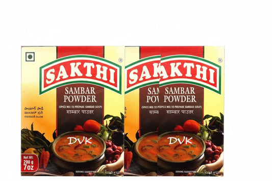 Two packages of Sakthi Sambar Powder on a white background