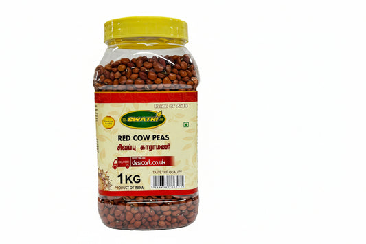 Jar of red cow peas with a yellow lid on a white background
