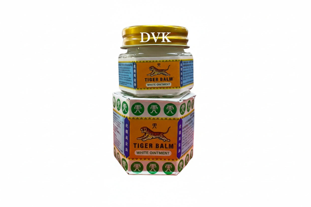 Jar of Tiger Balm white ointment with packaging on a white background