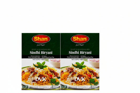 Two packages of Shan Sindhi Biryani recipe and seasoning mix on a white background
