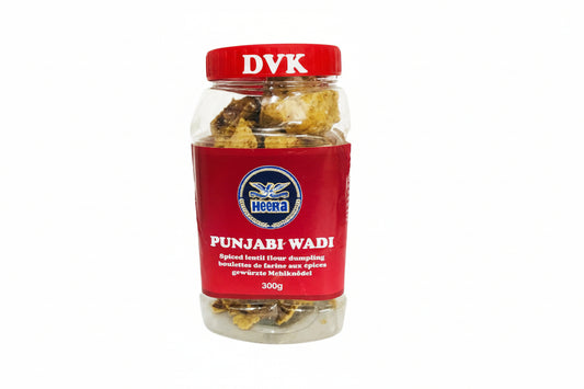 Jar of Punjabi Wadi with red label and DVK's branding on a white background