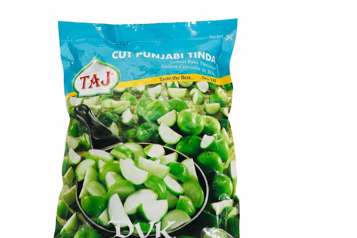 Packaged green vegetables with Taj brand logo on a white background