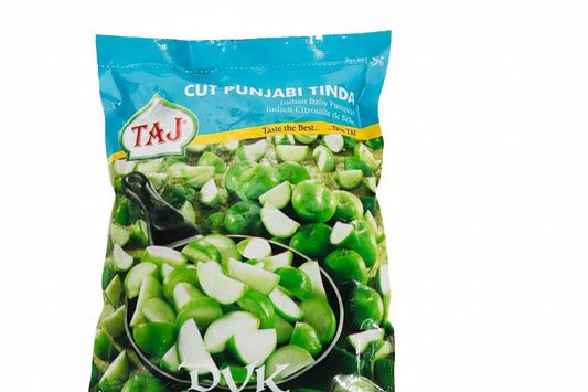 Packaged green vegetables with Taj brand logo on a white background