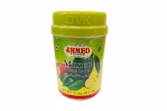 Jar of Ahmed Foods Mixed Pickle in Oil with a green lid on a white background