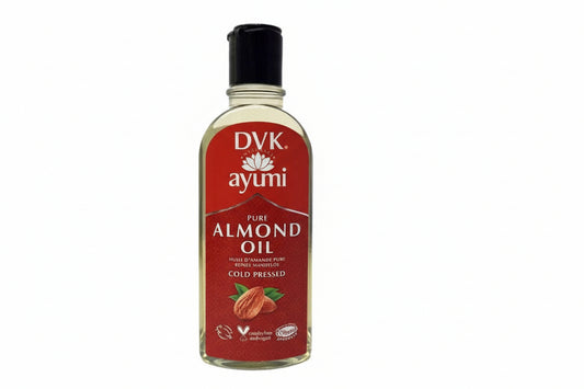 Bottle of AYUMI pure almond oil with a red label on a white background