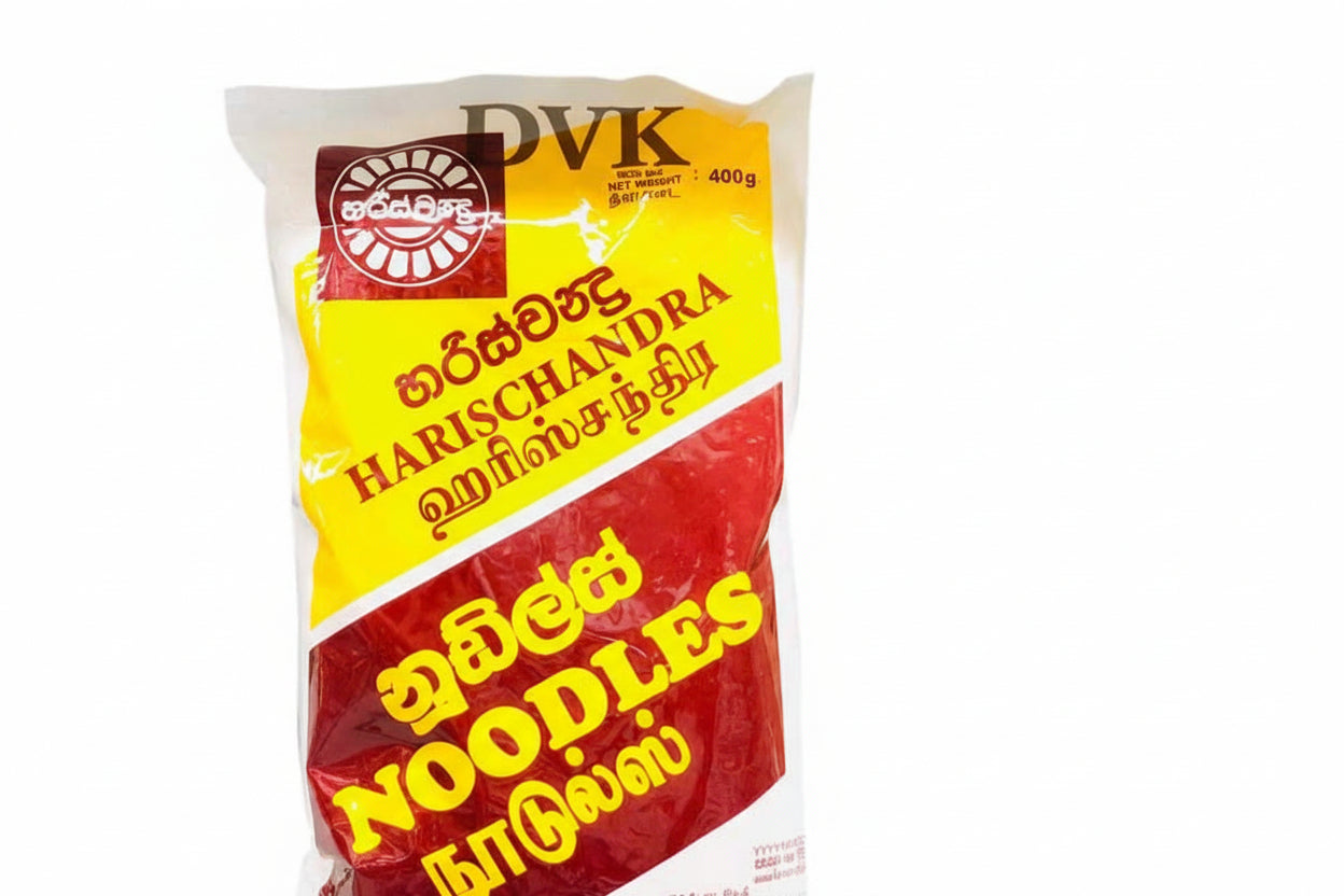 Bag of Harischandra noodles with red and yellow design on a white background