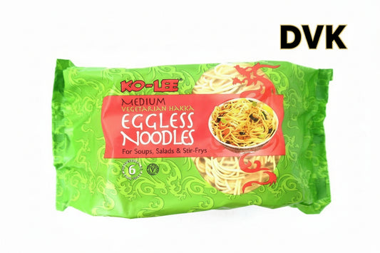Packaged eggless noodles with green and red design on a white background