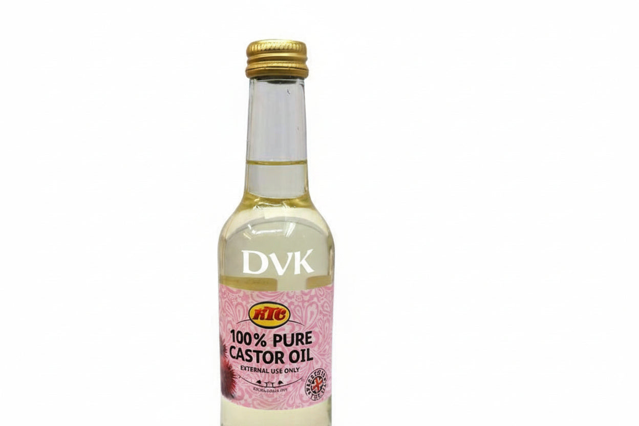 Bottle of 100% pure castor oil with a pink label on a white background