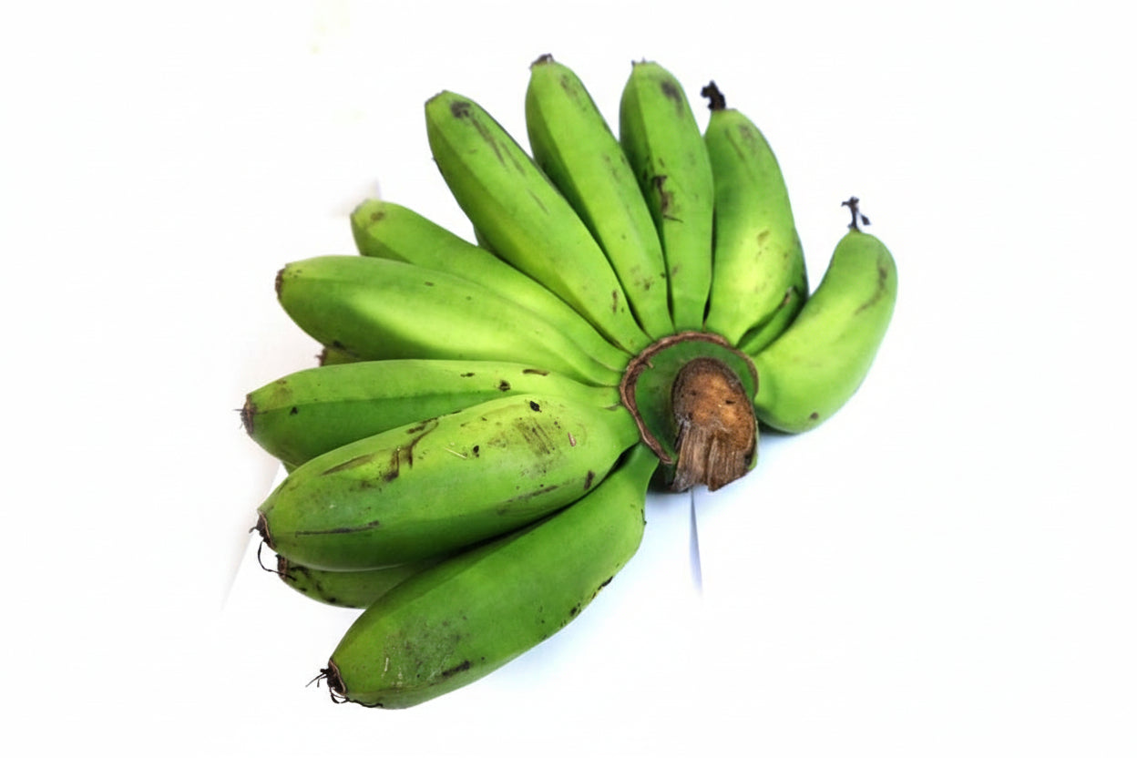 Bunch of green bananas on a white 