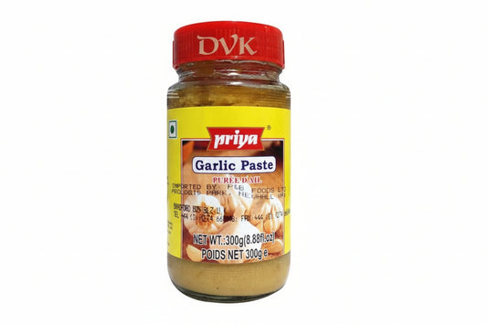 Jar of Priya Garlic Paste with a red lid on a white background