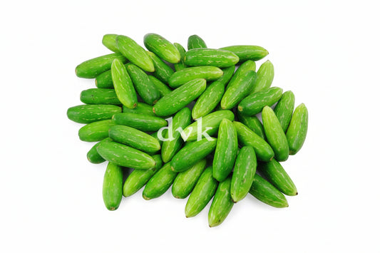Green cucumbers on a white 