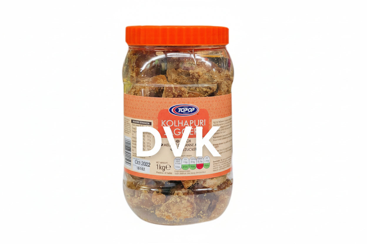 Jar of Kolhapuri Jaggery with orange lid and label on a white background